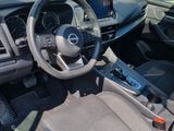 a car with a steering wheel and a dash board