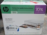 a box with a printer on it sitting on the ground