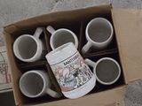 a box full of coffee cups sitting on the floor