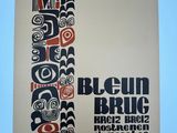 a close up of a poster on a wall with a totemic design