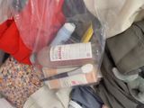 a bag full of clothes and other items that are in it