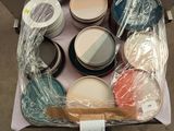 a box full of different colors of paint on a table