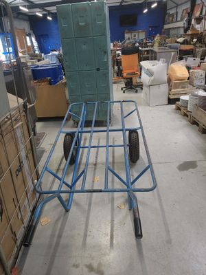 a cart that is sitting in the middle of a warehouse