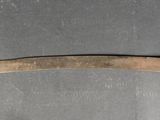 a small knife that is laying on a table