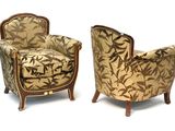 pair of upholstered armchairs in the style of louis xv