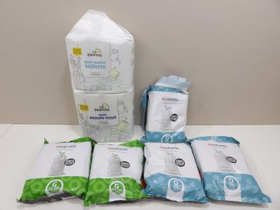 cinq paquets de papier toilette et un paquet de papier toilette