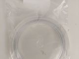 a close up of a piece of plastic on a white surface