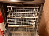an image of a dishwasher with a basket inside of it
