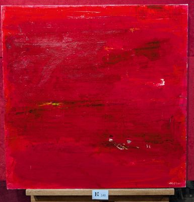 une image représentant un tableau représentant un carré rouge posé sur un chevalet en bois