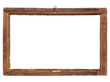 an old wooden picture frame hanging on a white wall