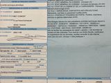 a receipt on a table with a barcode on it