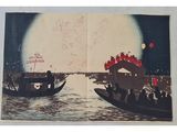 two boats that are going down the river at night