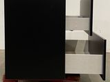 an image of a black and white piece of furniture
