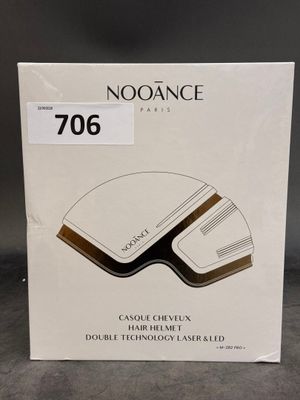 an image of a box of noorance hair care products on a table