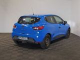 a picture of a blue car parked in a room