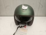 a helmet with a tag on it sitting on a table