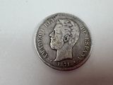 a coin with a woman ' s face on it