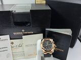 a watch that is sitting on a table next to other items