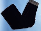 a picture of a pair of black pants on a blue background