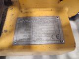 a picture of a close up of a metal plate on a machine