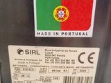 a sticker on the back of a motorcycle with the flag of portugal on it