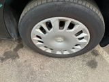 a close up of a tire on the side of a car