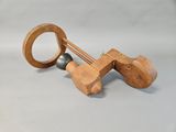 a small wooden object that is on a table