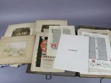 a book open on a table with a bunch of papers on it