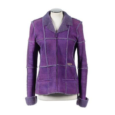 the jacket is purple and has a fur lined collar