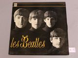 a black and white photo of the beatles album