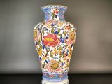 a vase that is sitting on a black table
