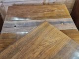 several pieces of wood are stacked on top of each other
