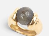 an image of a close up of a ring with a stone on it