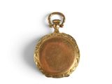 an old gold pocket watch with a chain on a white background