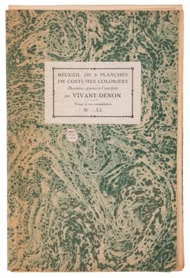 an old book with a green cover and white writing on it