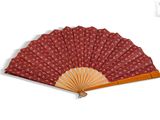an image of a red fan with a wooden handle on a white background