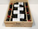 six bottles of wine in a wooden case