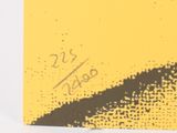 a picture of a yellow and black picture on a white surface