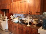 many vases on the counter in this kitchen