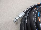 a hose that is connected to a hose on the ground