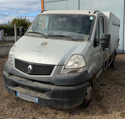 an image of a van that is parked in front of a building