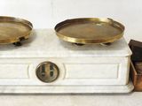two bowls sitting on top of a white box
