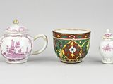 three different types of teapots and a tea pot