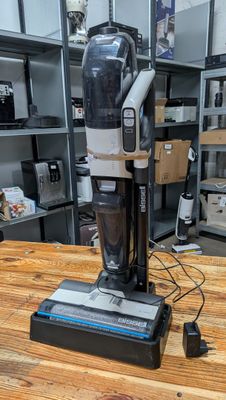a vacuum that is sitting on a table in a room