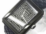 an image of a wrist watch with a circuit design on it