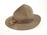 an image of a hat with a tassel on top of it