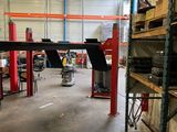 an image of a garage with a lot of tools on the shelves