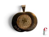 an image of a gold coin with a cross on it