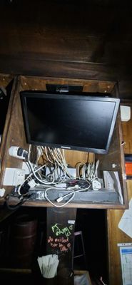 a television that is sitting on top of a wooden table