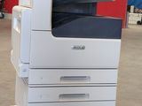 an image of a multi - function printer in a warehouse
